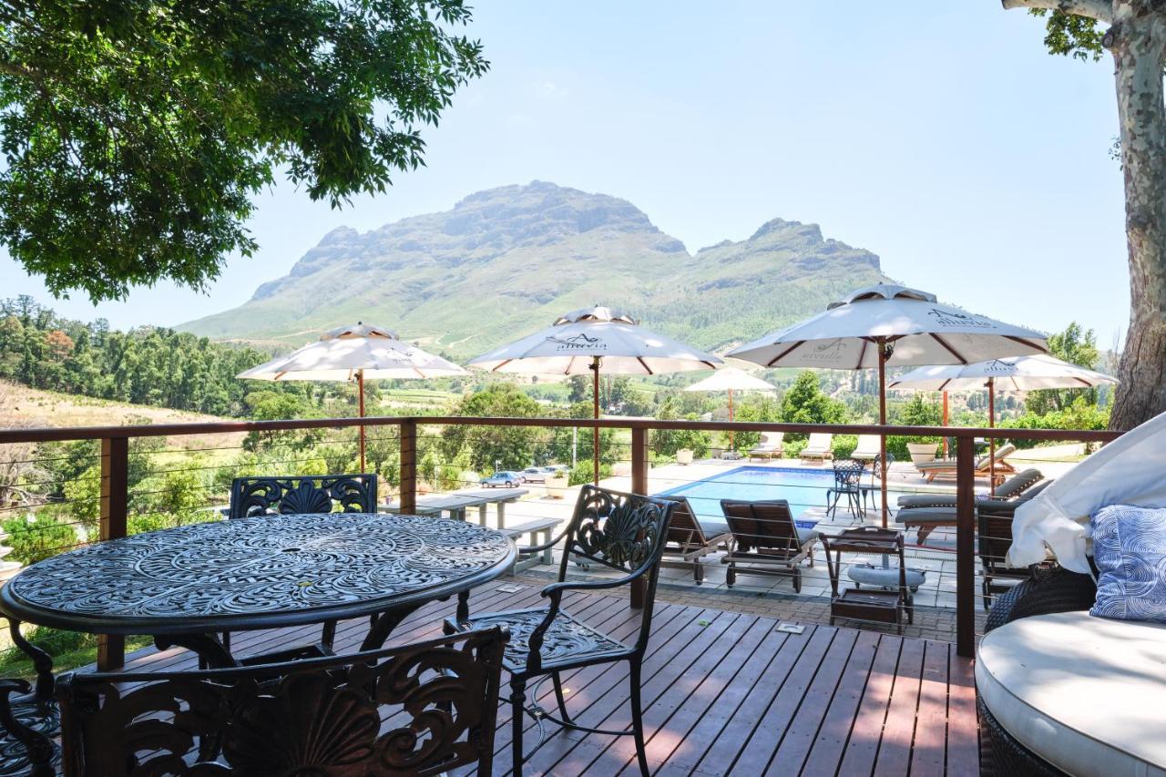 Alluvia Boutique Winery & Luxury Accommodation Stellenbosch Exterior foto View of the Three Sisters from the deck of the restaurant at the Boschendal Wine Estate