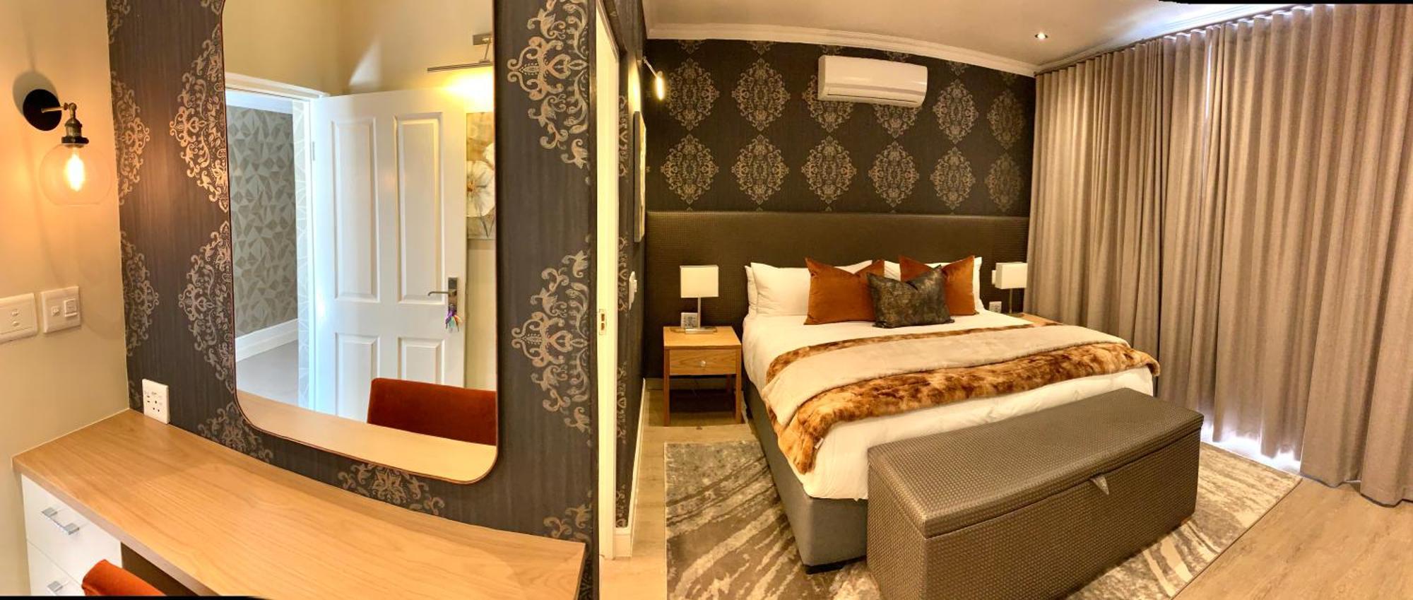 Alluvia Boutique Winery & Luxury Accommodation Stellenbosch Quarto foto A bedroom at the Cape Heritage